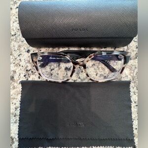 Prada Women's Black and Brown Patterned Glasses